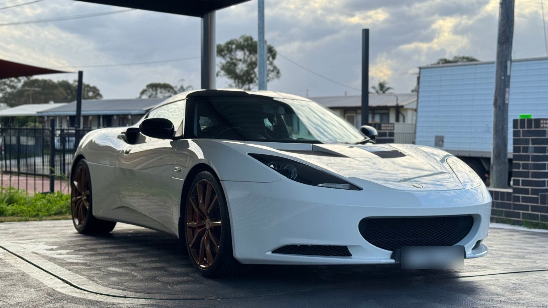 White Lotus Evora after multi-stage paint correction